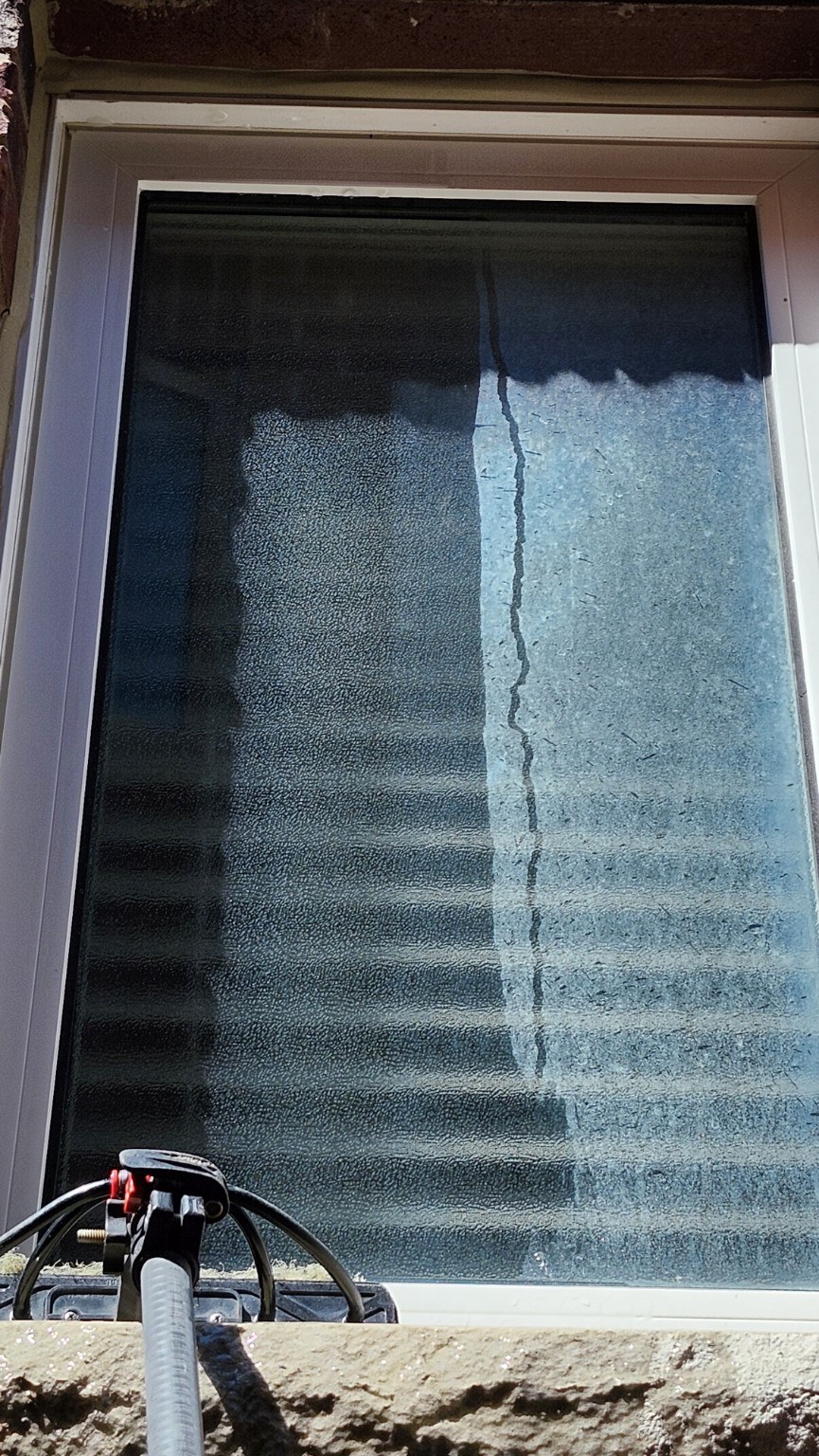 Window cleaning in progress